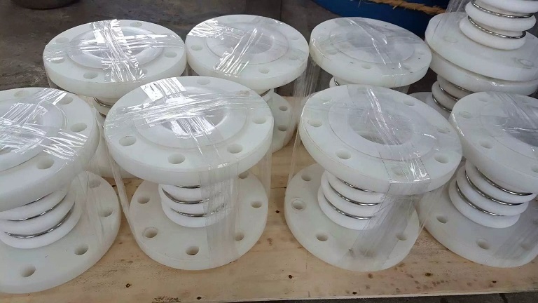 PTFE expansion joints with PTFE flanges